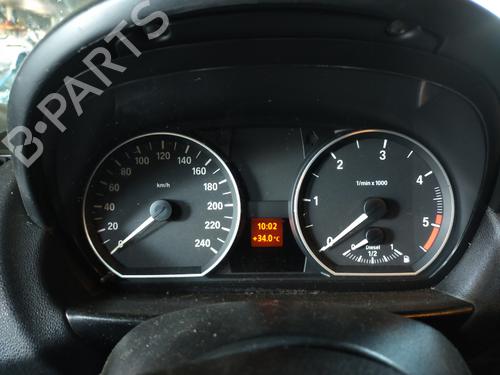 Used Instrument cluster BMW 1 (E87) 118 d (122 hp) 10624274