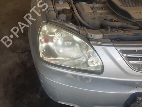 Used Right headlight KIA CARENS II MPV (FJ) 2.0 CRDi (113 hp) 18486634