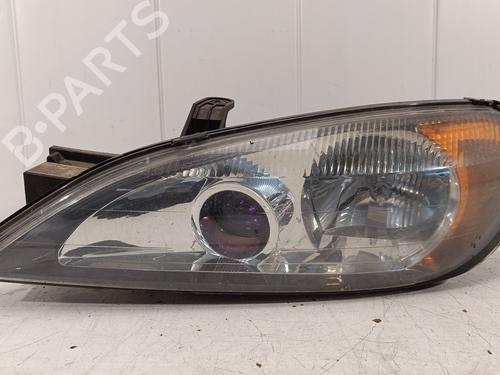 Left headlight NISSAN PRIMERA (P11) 1.8 16V 89003044