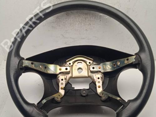 Used Steering wheel Steering wheel KIA SHUMA I (FB) 1.5 i 16V (AFB242) (88 hp) 4256128 4256128