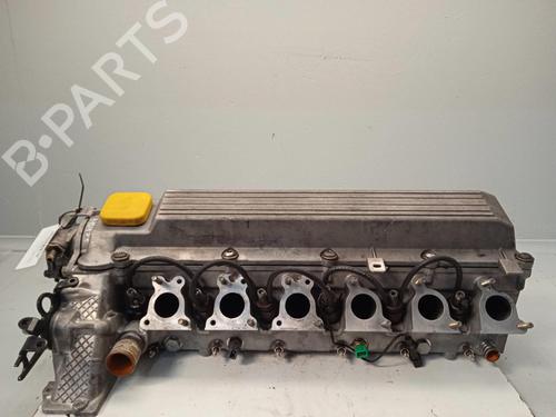 Used Cylinder head OPEL OMEGA B (V94) 2.5 TD (F69, M69, P69) (130 hp) 15123088