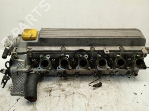 Used Cylinder head Cylinder head OPEL OMEGA B (V94) 2.5 TD (F69, M69, P69) (130 hp) 11148207 11148207