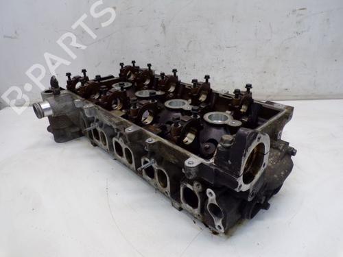 Used Cylinder head OPEL ZAFIRA / ZAFIRA FAMILY B (A05) 2.2 (M75) (150 hp) 24470558