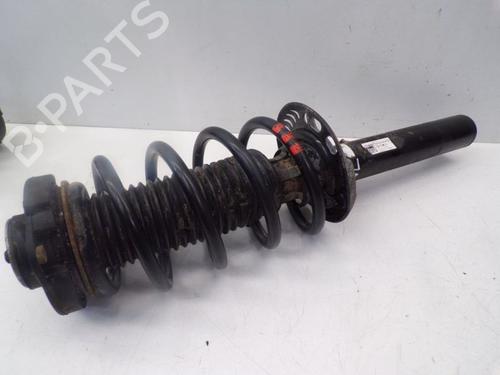 Used Left front shock absorber SKODA OCTAVIA II Combi (1Z5) 1.6 TDI (105 hp) 18805604