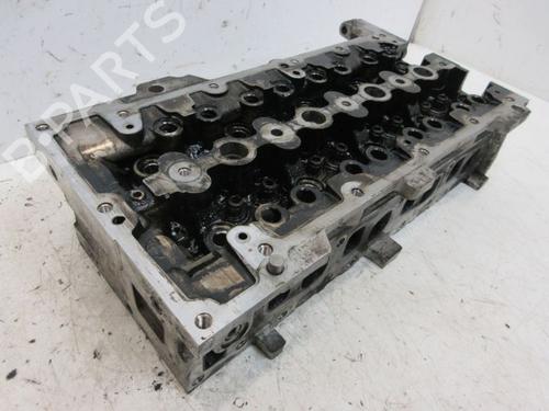 Used Cylinder head OPEL CORSA E (X15) 1.3 CDTI (08, 68) (75 hp) 25013516