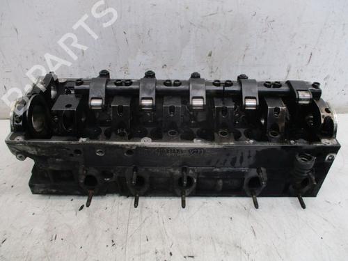Used Cylinder head VW TRANSPORTER T5 Bus (7HB, 7HJ, 7EB, 7EJ) 2.5 TDI (130 hp) 19299328