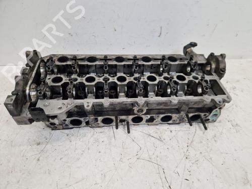 Used Cylinder head VOLVO V70 II (285) D5 (185 hp) 29574923