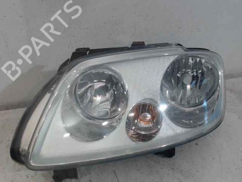 Used Left headlight VW TOURAN (1T1, 1T2) 1.9 TDI (90 hp) 24900941