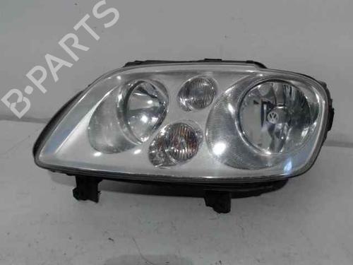 Used Left headlight VW TOURAN (1T1, 1T2) 1.9 TDI (105 hp) 25763242