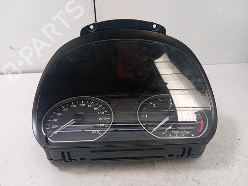 Used Instrument cluster BMW 1 (E81) 118 d (143 hp) 16888621