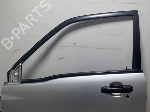 Used Left front door SUZUKI GRAND VITARA I (FT, HT) 2.0 HDI 110 16V 4x4 (SQ420D, TD83V, JA420WD) (109 hp) 26199328