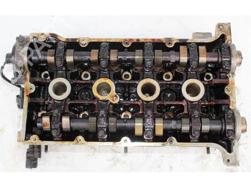 Used Cylinder head KIA CARENS I (FC) 1.8 i (110 hp) 15147371