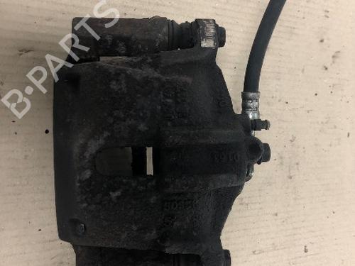 Højre bremsekaliber foran TOYOTA YARIS (_P1_) 1.3 (SCP12_, SCP13_, SCP12R, SCP13R) (87 hp) 15534799
