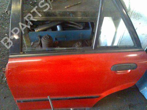 Used Left rear door MAZDA 323 F VI Hatchback (BJ) 1.3 16V (BJ3P, BJ14) (73 hp) 15694076