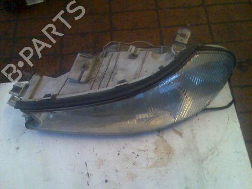 Used Left headlight FORD MONDEO II Turnier (BNP) 1.8 TD (90 hp) 15694584