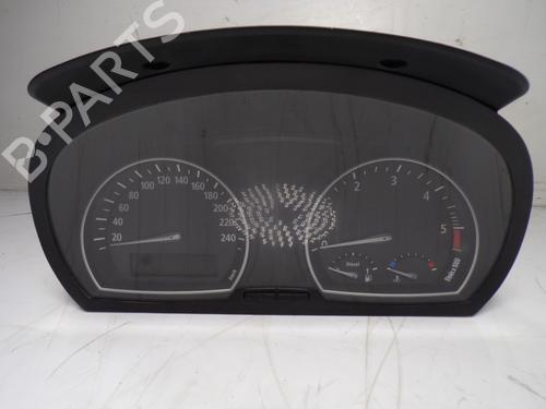 Used Instrument cluster BMW X3 (E83) 2.0 d (150 hp) 12569412