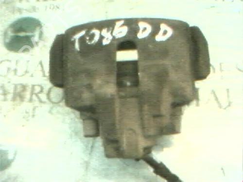 Used Right front brake caliper FORD MONDEO II Turnier (BNP) 1.8 TD (90 hp) 11554861