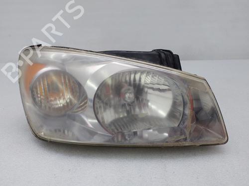 Left headlight KIA CERATO I Hatchback (LD) 1.5 CRDi C/ VERNIZ A LEVANTAR