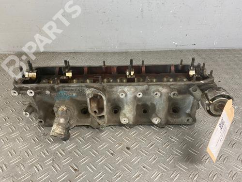 Used Cylinder head AUDI 100 C4 Saloon (4A2) 2.3 E (133 hp) 9818760
