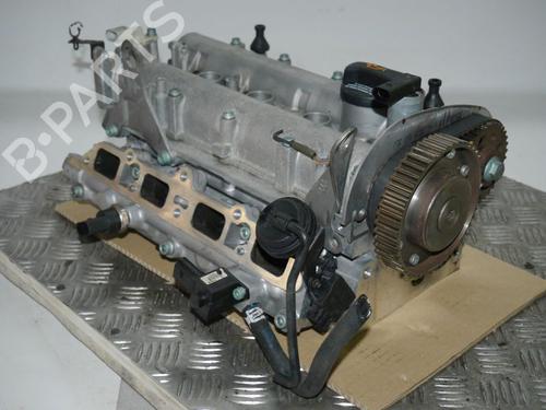 Used Cylinder head VW GOLF IV (1J1) 1.6 FSI (110 hp) 29644780