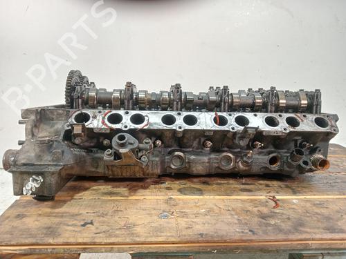 Used Cylinder head MERCEDES-BENZ C-CLASS (W202) C 250 Turbo-D (202.128) (150 hp) 31149155
