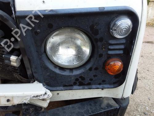 Used Left headlight LAND ROVER DEFENDER Station Wagon (L316) 2.5 Td5 4x4 (L316) (122 hp) 17847630