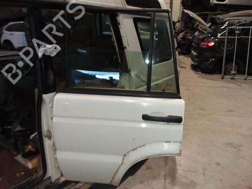 Used Left rear door Left rear door LAND ROVER DISCOVERY II (L318) 2.5 Td5 4x4 (139 hp) 34555453 34555453