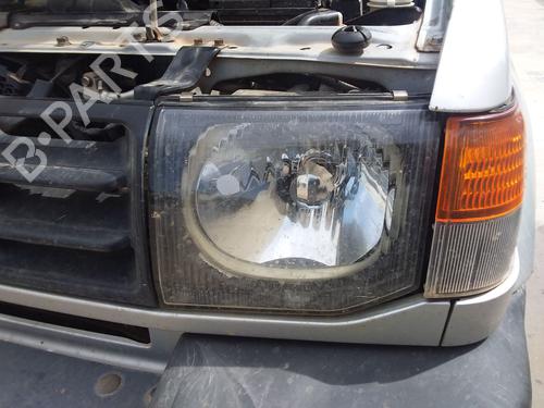 Used Left headlight MITSUBISHI GALLOPER (JK-01) 2.5 TD intercooler (99 hp) 25671408