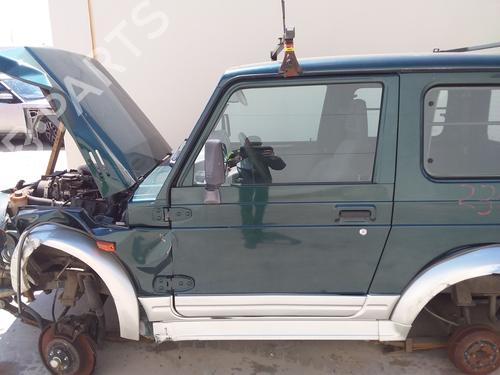 Used Left front door Left front door SUZUKI SAMURAI Closed Off-Road Vehicle (SJ_) 1.9 TD All-wheel Drive (SJ419TD) (63 hp) 39243404 39243404