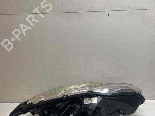 Used Left headlight RENAULT LAGUNA III (BT0/1) 2.0 dCi (BT07, BT0J, BT14, BT1A, BT1S) (131 hp) 18215912