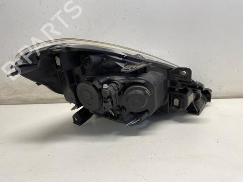 Faro izquierdo Faro izquierdo RENAULT CLIO III (BR0/1, CR0/1) 1.5 dCi (C/BR0G, C/BR1G) (68 hp) 37079594 37079594