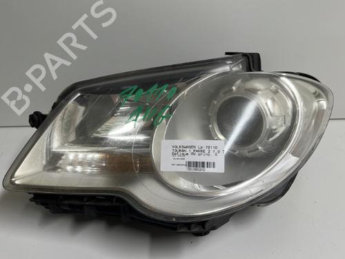 Used Left headlight VW TOURAN (1T1, 1T2) 1.9 TDI (105 hp) 18569852