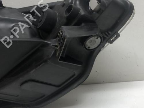 Used Left headlight PEUGEOT 1007 (KM_) 1.4 HDi (68 hp) 18223312
