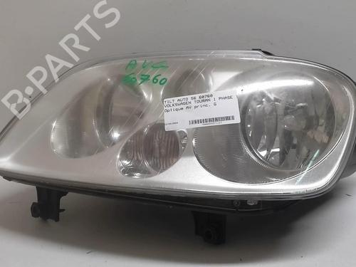 Used Left headlight VW TOURAN (1T1, 1T2) 1.9 TDI (100 hp) 18211358