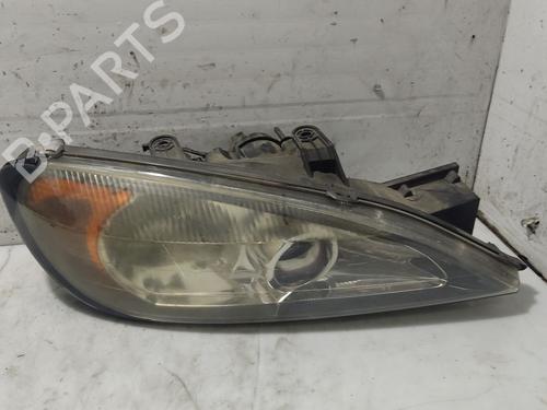 Used Right headlight NISSAN PRIMERA Hatchback (P11) 2.0 TD (90 hp) 31106290