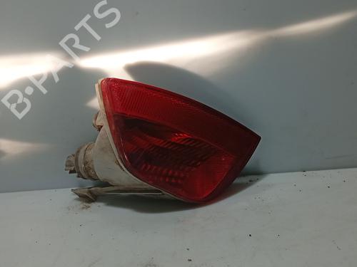 Used Rear bumper left light FORD FOCUS I (DAW, DBW) 1.8 Turbo DI / TDDi (90 hp) 31100486