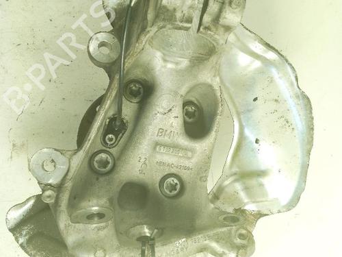 Used Left front steering knuckle BMW 1 (F20) 116 d (116 hp) 24861946