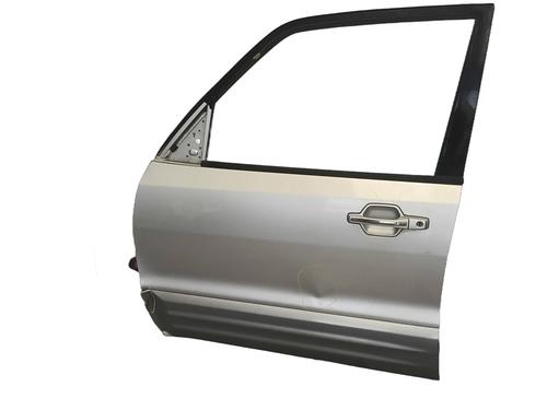Used Left front door Left front door MITSUBISHI PAJERO III Canvas Top (V6_W, V7_W) 3.2 DI-D (V68W, V78W) (165 hp) 34392006 34392006