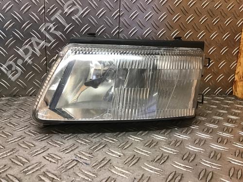 Used Left headlight VW PASSAT B5 (3B2) 1.6 (101 hp) 23953851