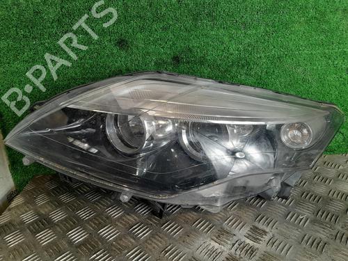 Used Left headlight RENAULT LAGUNA III (BT0/1) 2.0 dCi (BT07, BT0J, BT14, BT1A, BT1S) (131 hp) 29911425