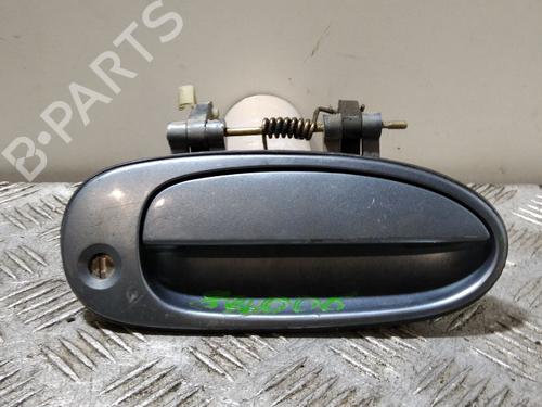 Używane Klamka zewnętrzna drzwi przednich prawych KIA CARENS I MPV (FC, FJ) 1.8 i (110 hp) 29865799