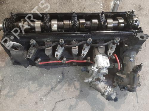 Used Cylinder head FORD FOCUS I Saloon (DFW) 1.8 Turbo DI / TDDi (90 hp) 32387797