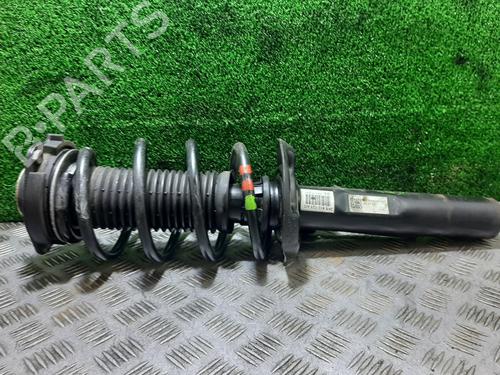 Used Left front shock absorber VW CADDY III Box Body/MPV (2KA, 2KH, 2CA, 2CH) 1.6 TDI (75 hp) 23110499