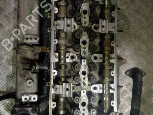 Used Cylinder head KIA CARNIVAL II (GQ) 2.9 CRDi (144 hp) 10969898