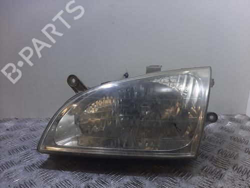 Scheinwerfer links für KIA CARENS I MPV (FC, FJ) 1.8 i (110 hp) 29865809