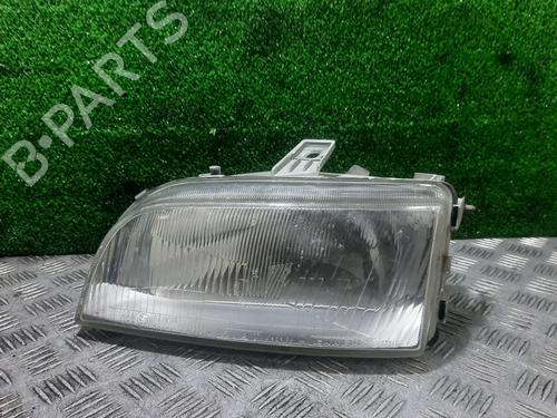 Used Left headlight FIAT PUNTO (176_) 1.7 TD (176AT) (63 hp) 23434232