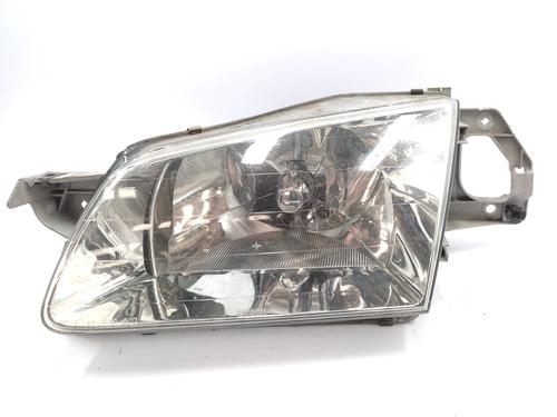 Used Left headlight MAZDA 323 S V (BA) 1.5 16V (BA11) (88 hp) 24683296