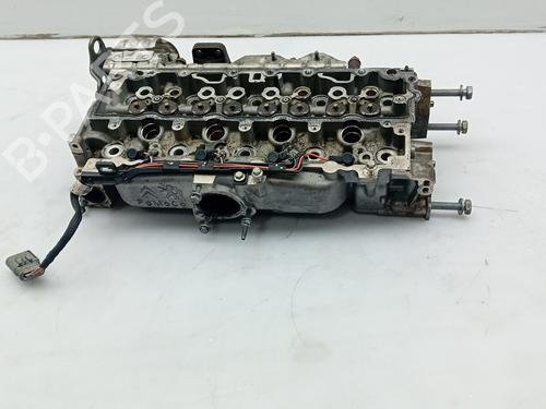 Used Cylinder head FORD FIESTA VI (CB1, CCN) 1.5 TDCi (75 hp) 20178722