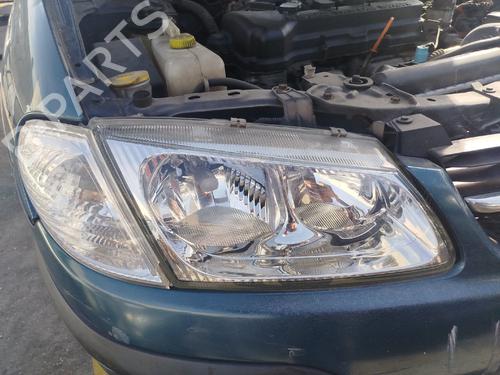 Used Right headlight NISSAN ALMERA II Hatchback (N16) 1.5 (90 hp) 29592901