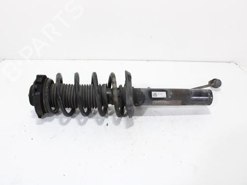 Used Left front shock absorber VW PASSAT B7 (362) 2.0 TDI (140 hp) 15658294